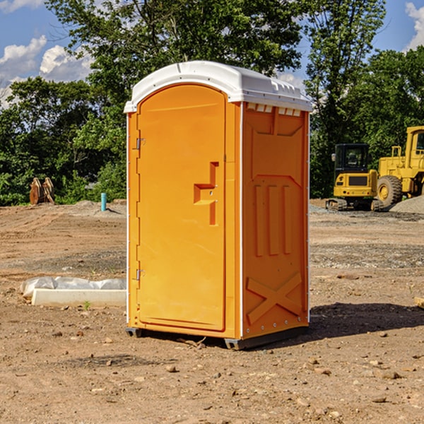 how often are the portable restrooms cleaned and serviced during a rental period in Alpha Michigan